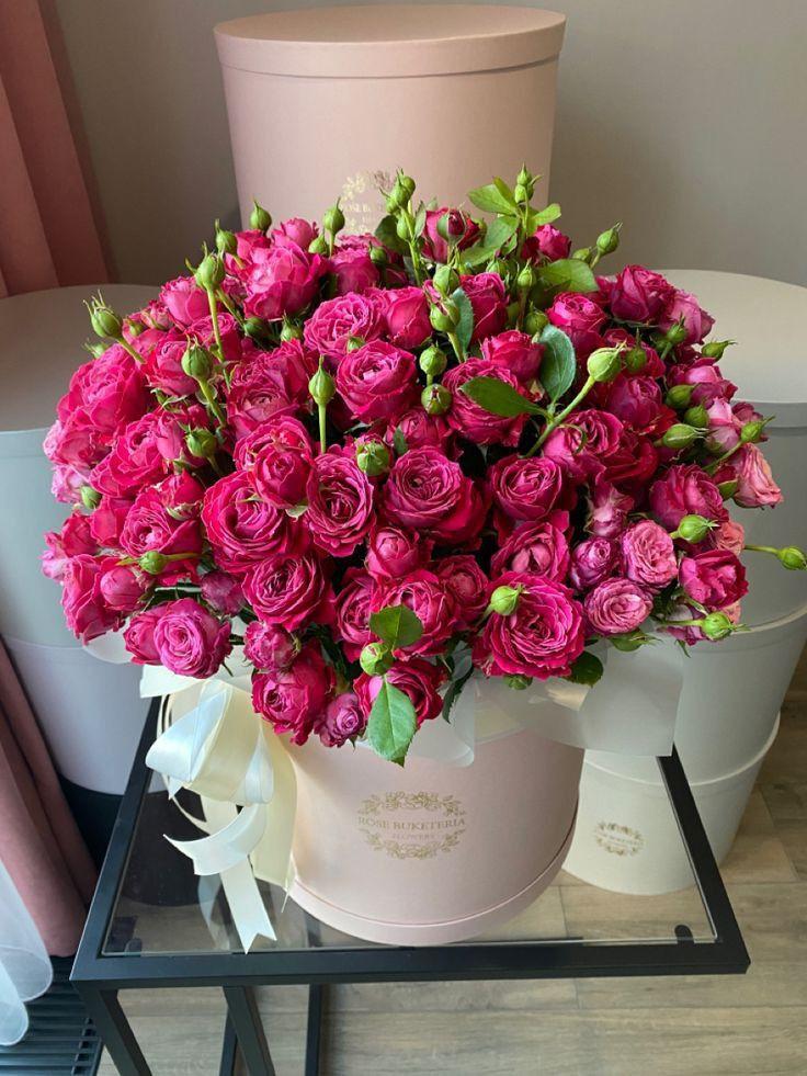 Professional floral arrangement in modern corporate setting